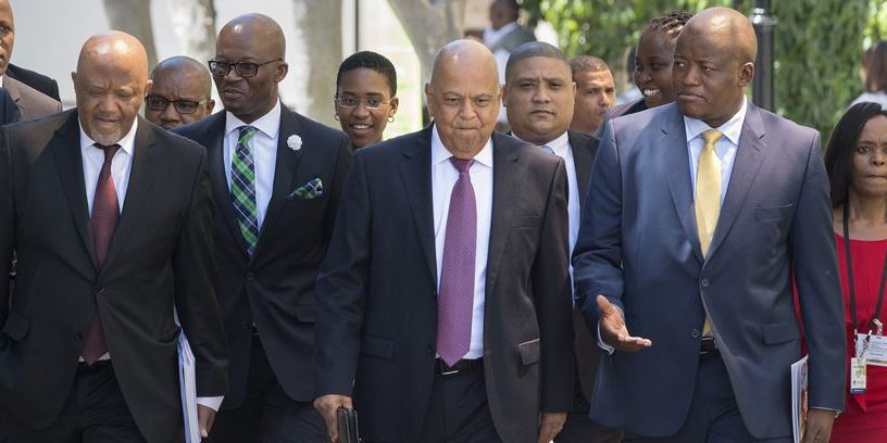Weekly news – 1 March 2017 Pravin Gordhan walks with members of the Finance Ministry